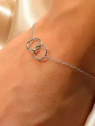 Minimalistinė sidabrinė apyrankė su dviem žiedais