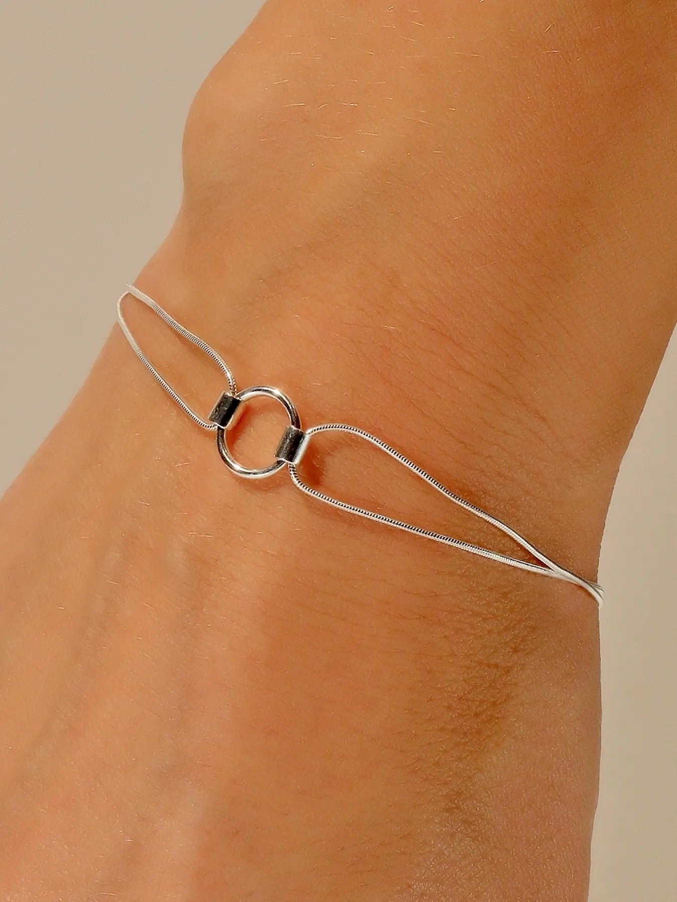 Sterling silver bracelet with circle pendant