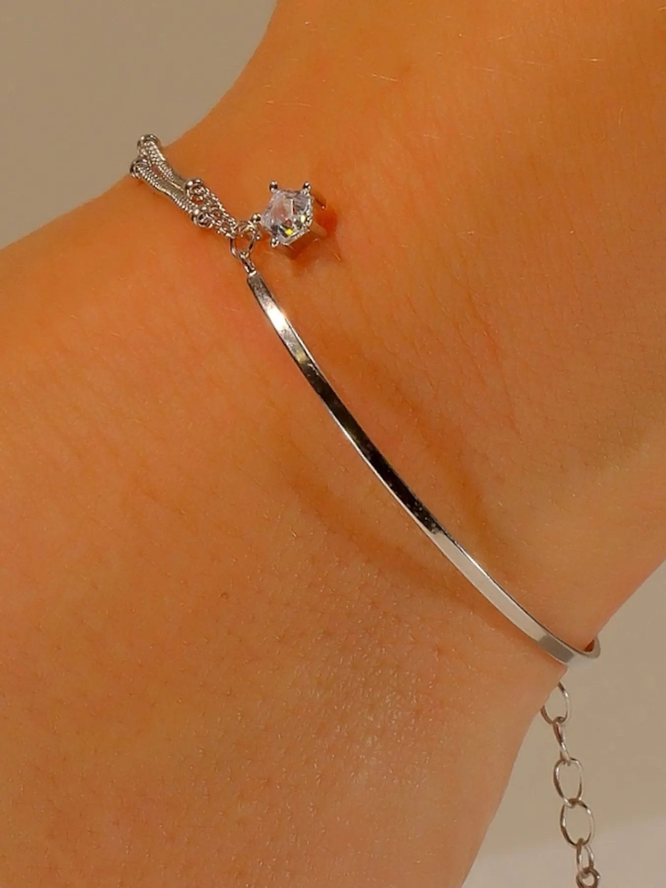 Sterling silver bracelet with star charm