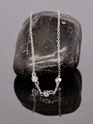 Minimalist silver bracelet with three zircon stones