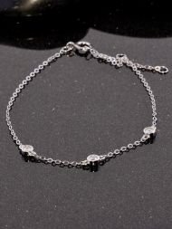 Minimalistinė sidabrinė apyrankė su trimis cirkonio akmenukais