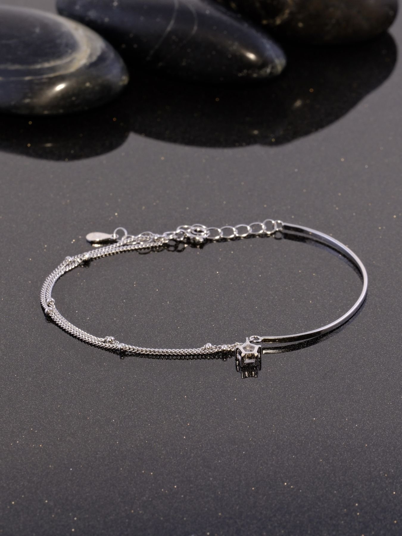 Sterling silver bracelet with star charm