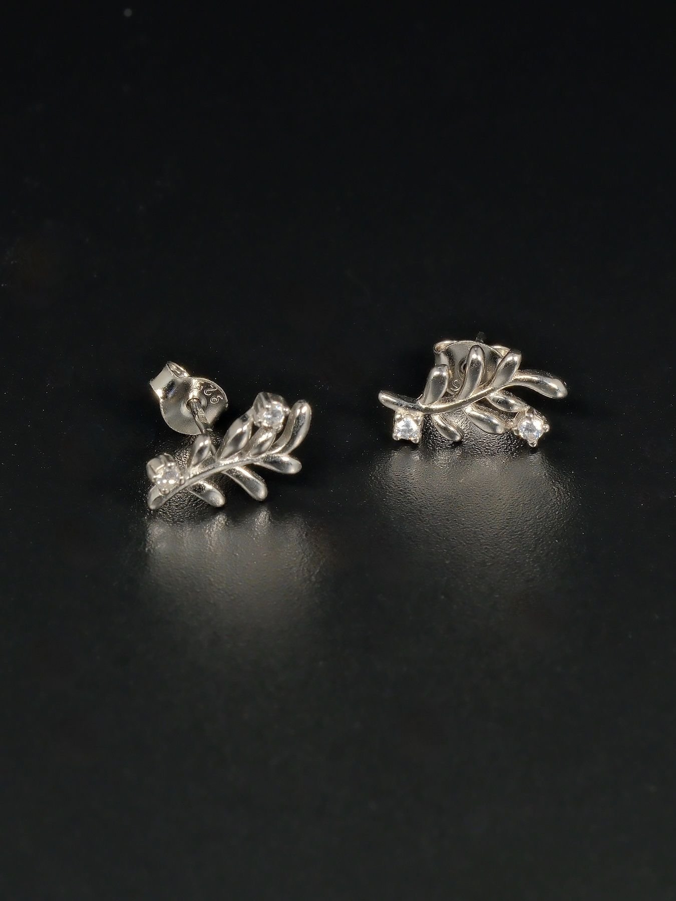 Silver earrings with zircon – leaf branch design
